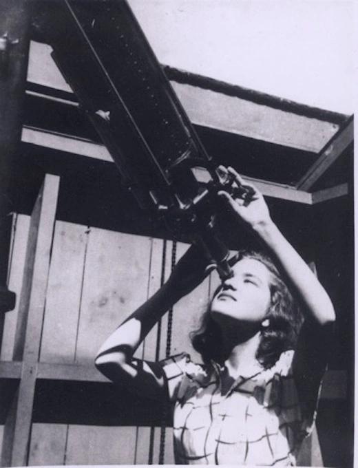 Curious at 18, Vera Rubin looked through the Vassar College Telescope, 1946.