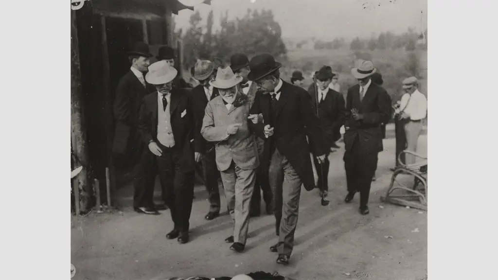 Andrew Carnegie and George Ellery Hale walk arm in arm 