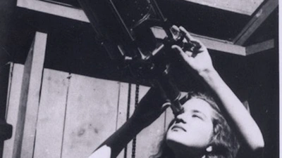 Curious at 18, Vera Rubin looked through the Vassar College Telescope, 1946.