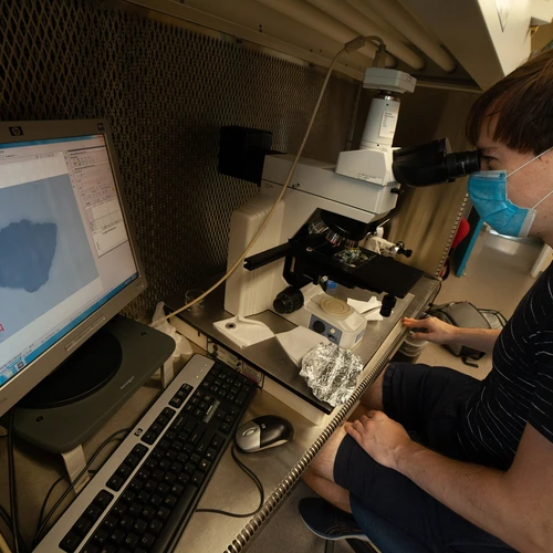 Jens Barosch Examines a Ryugu Sample Under Microscope