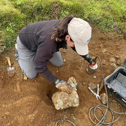 Diana Roman works with a Quick Deploy Box (QDB) at a research site in Iceland