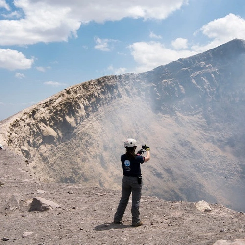 EPL scientist stands at the edge of a volcano