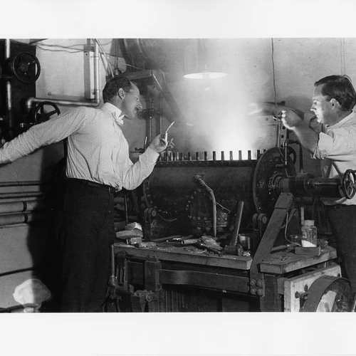 Geophysical Laboratory scientist Arthur Day and a colleague experiment using an electric arc furnace, circa 1906.
